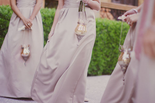 bridesmaids carrying lanterns